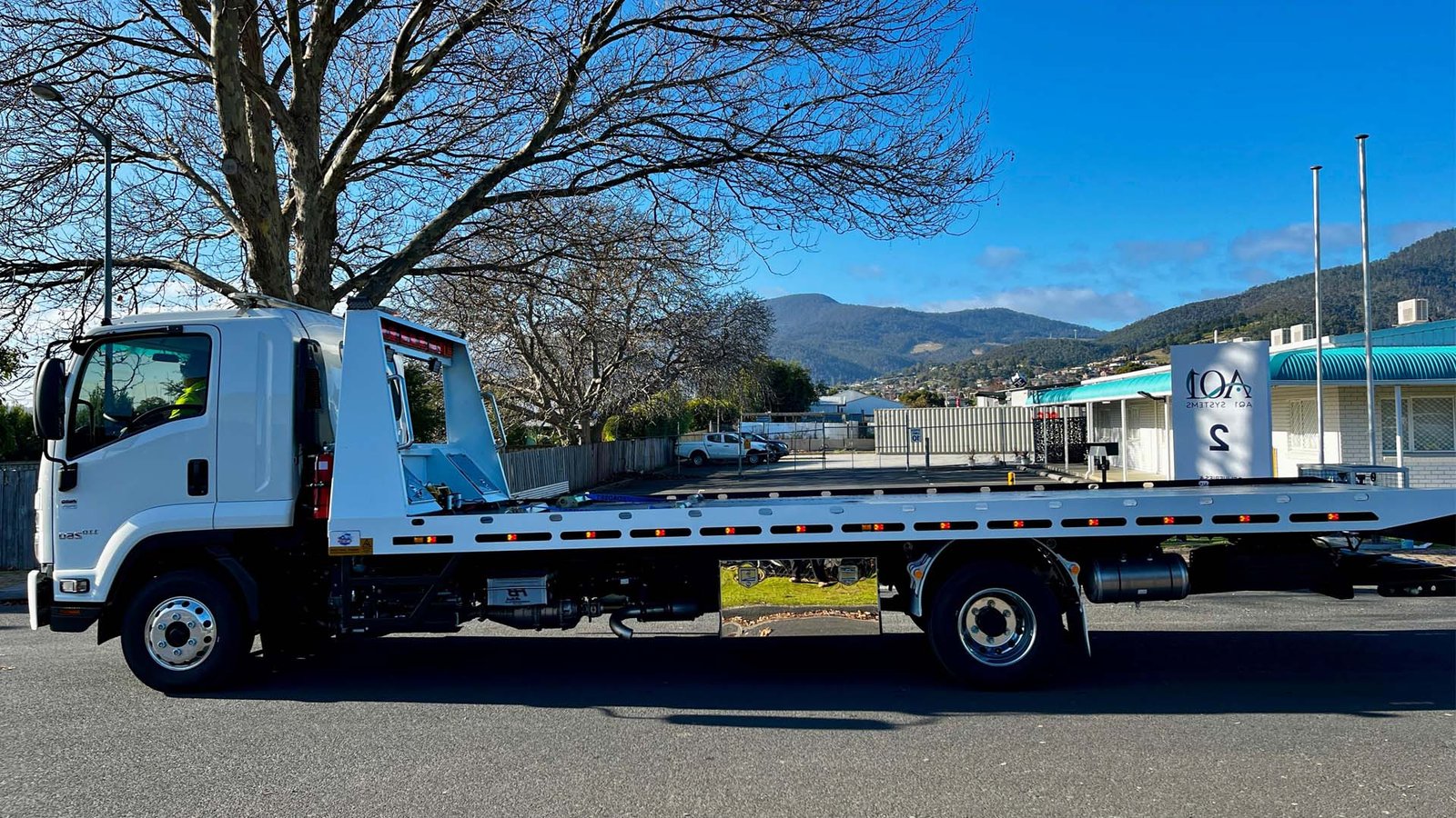 Big Boy Towing's truck from the side